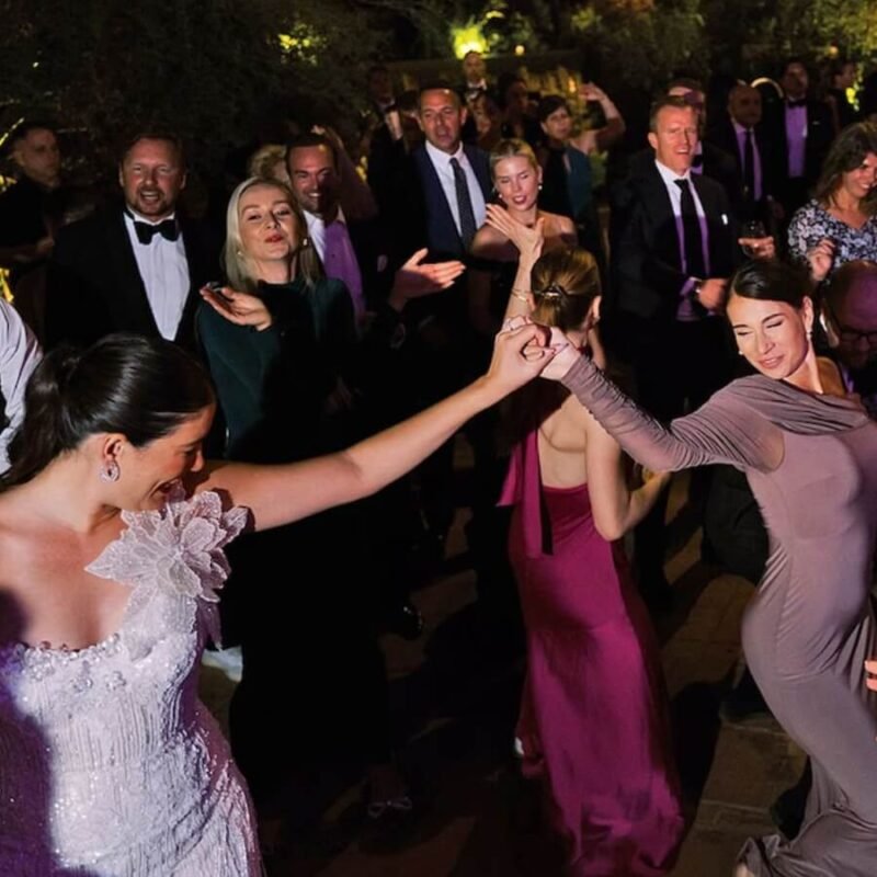 Guests dancing at a luxury wedding party with live music in Spain